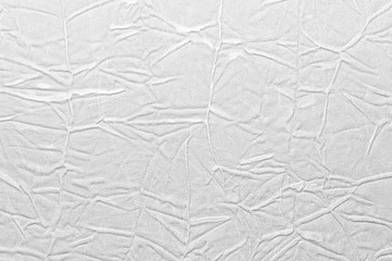 White crumpled leather texture. fabric with folds imitation under genuine leather. background. wallpaper