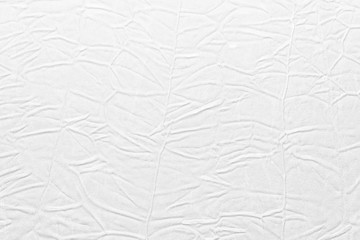 White crumpled leather texture. fabric with folds imitation under genuine leather. background. wallpaper
