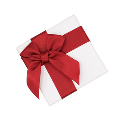 Top view white gift box with red ribbon isolated on white background with clipping path, Christmas and new year's day concept