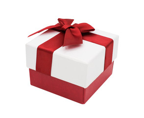 Closeup white gift box with red ribbon isolated on white background with clipping path, Christmas and new year's day concept