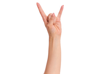 Female hand showing heavy metal Rock gesture, isolated on white background. Beautiful hand of woman with copy space. Hand pointing two fingers.