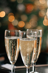 three glasses of champagne for Christmas celebration © Mannaïg