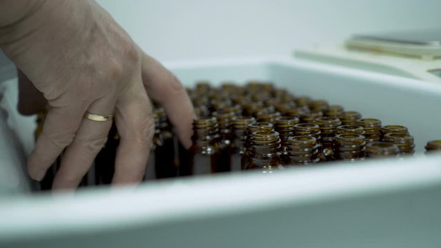 Close Look of Scientist Working With Pharmaceutical Cbd Oil In A Laboratory 