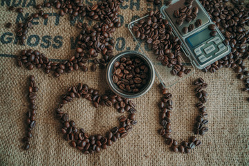 modern coffee scale and coffee grinder on old table