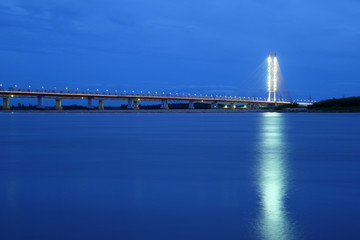 Night view of the Ob river and Yugorsky bridge in Western Siberia