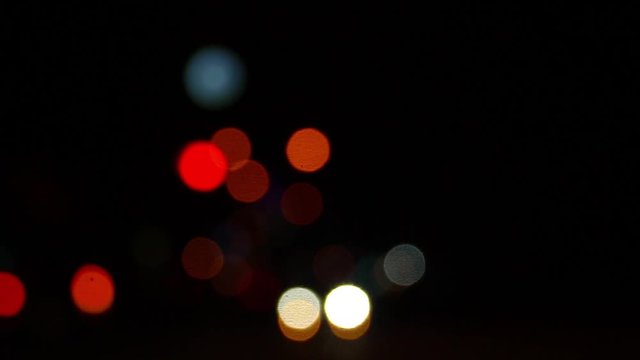 Bokeh lights, road traffic and the city at night