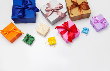 Multi-colored gift boxes with bow. Flatlay