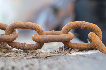 Rusty old iron chains close-up.