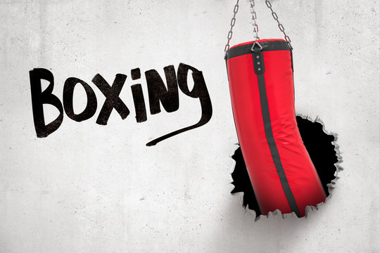 3d rendering of red punching bag breaking white wall with 'Boxing' sign on white background