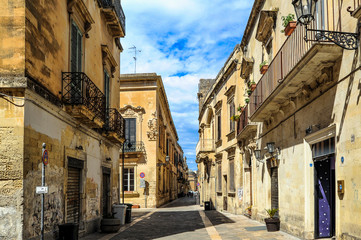 Fototapeta na wymiar Lecce is called the Baroque Florence, as well as the Baroque Capital of Puglia. The city owes its Golden color of its buildings of local limestone 