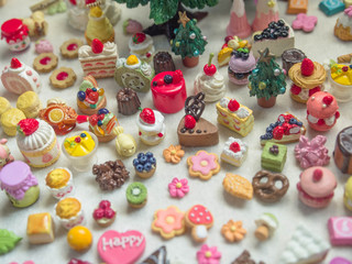 Merry Chrismas with a lot of miniature toys. Sweet party, dessert table toy concept.