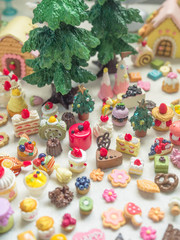 Merry Chrismas with a lot of miniature toys. Sweet party, dessert table toy concept.