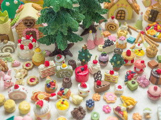 Merry Chrismas with a lot of miniature toys. Sweet party, dessert table toy concept.