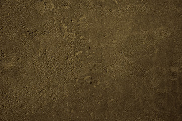 Urban concrete wall background with grooves and bubbles. Cement gray wall. Urban and industrialization art concept. Texture like concrete, stone, cement, plaster.. Poster mockup. Сloseup studio shot.