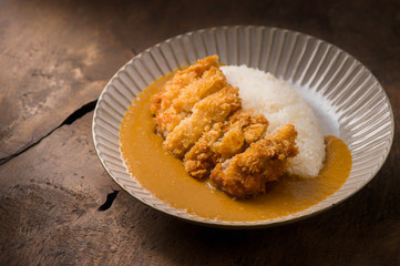 Japanese Cuisine. Fried Chicken Curry On The Background in lighting studio