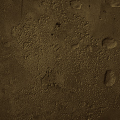 Urban concrete wall background with grooves and bubbles. Cement gray wall. Urban and industrialization art concept. Texture like concrete, stone, cement, plaster.. Poster mockup. Сloseup studio shot.