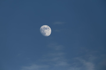 Naklejka na ściany i meble Moon over blue sky