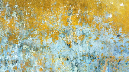 cracked concrete wall with old paint and peeling stucco background