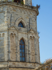 Fototapeta na wymiar Facade with window of Orthodox church of the 18th century. Pseudo-Gothic style of architecture.