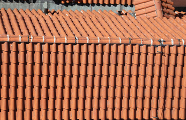Obraz na płótnie Canvas tiles on the rooftops of an european house