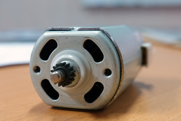 Small electric motor close up. Focus on foreground.