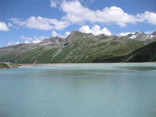 Blue mountain lake in the alps in summer