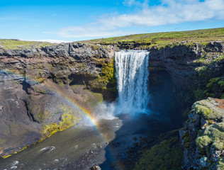 Beautifull waterfall on the Skoga River with rainbow and no people on famous Fimmvorduhals trail second part of Laugavegur trek. Summer landscape on a sunny day. Amazing in nature. August 2019, South
