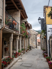 narrow street in Combarro, a fishing village in Spain