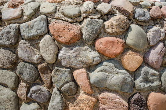 stones background. Part of a stone wall. Decorative, colored stones.