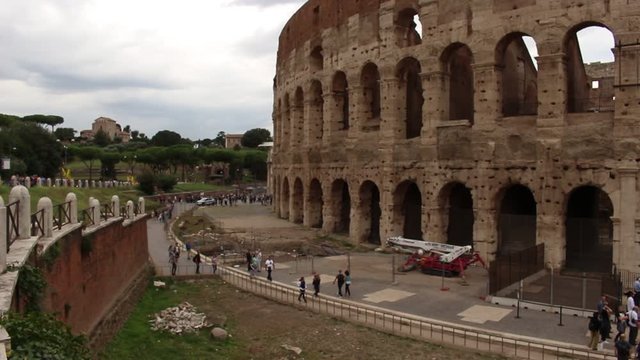 People walking at the foot of the Colosseum-Coliseum