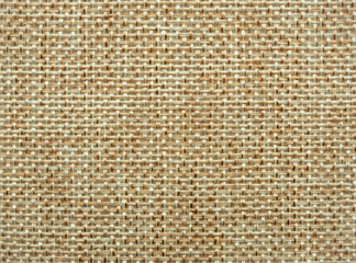 Close-up of hessian sackcloth woven vintage style material texture pattern background in beige color for used as backdrop or background