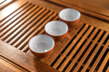 Chinese tea service on a wooden bamboo table