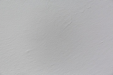 White textured wall with cracks
