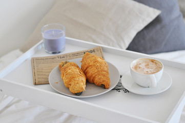 breakfast with coffee and croissant
