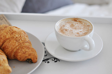 cup of coffee and croissant