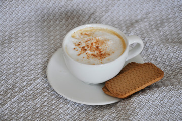 cup of coffee cappuccino and cookies