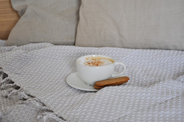 cup of coffee cappuccino and cookies