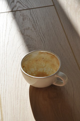 empty cup of coffee on wooden table