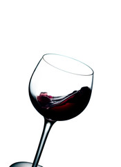 Glass of agitated red wine