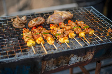Grilled meat scorched on the grill, burnt