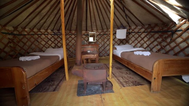 Pan: Chimney and bed in traditional Gers - Ulaanbaatar, Mongolia