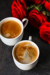 coffee in a white cup, bouquet red roses (gift, date or congratulation) menu concept. food background. copy space. Top view