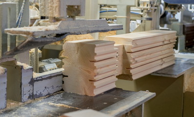 At sawmill. Shot of profiled bar during processing