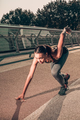 Experienced sportswoman at crouch start stock photo