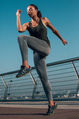 Stretching legs during regular exercises stock photo