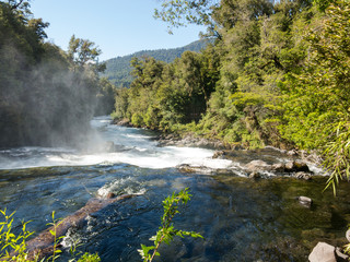 Naklejka na ściany i meble Waterfall of La Leona, in Huilo Huilo Biological Reserve, Los Ríos Region, southern Chile.