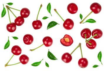 Some cherries with leaf closeup isolated on white background. With copy space for your text. Top view. Flat lay