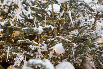 toy Christmas toys on the tree. Decorative fluffy Christmas trees and Christmas, New year.