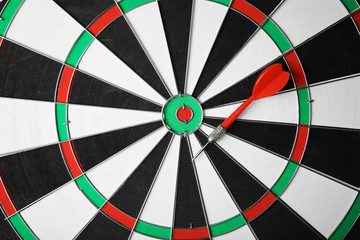 Red arrow on dart board, top view