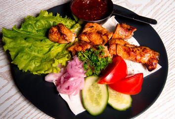 set of chicken meat with vegetables
